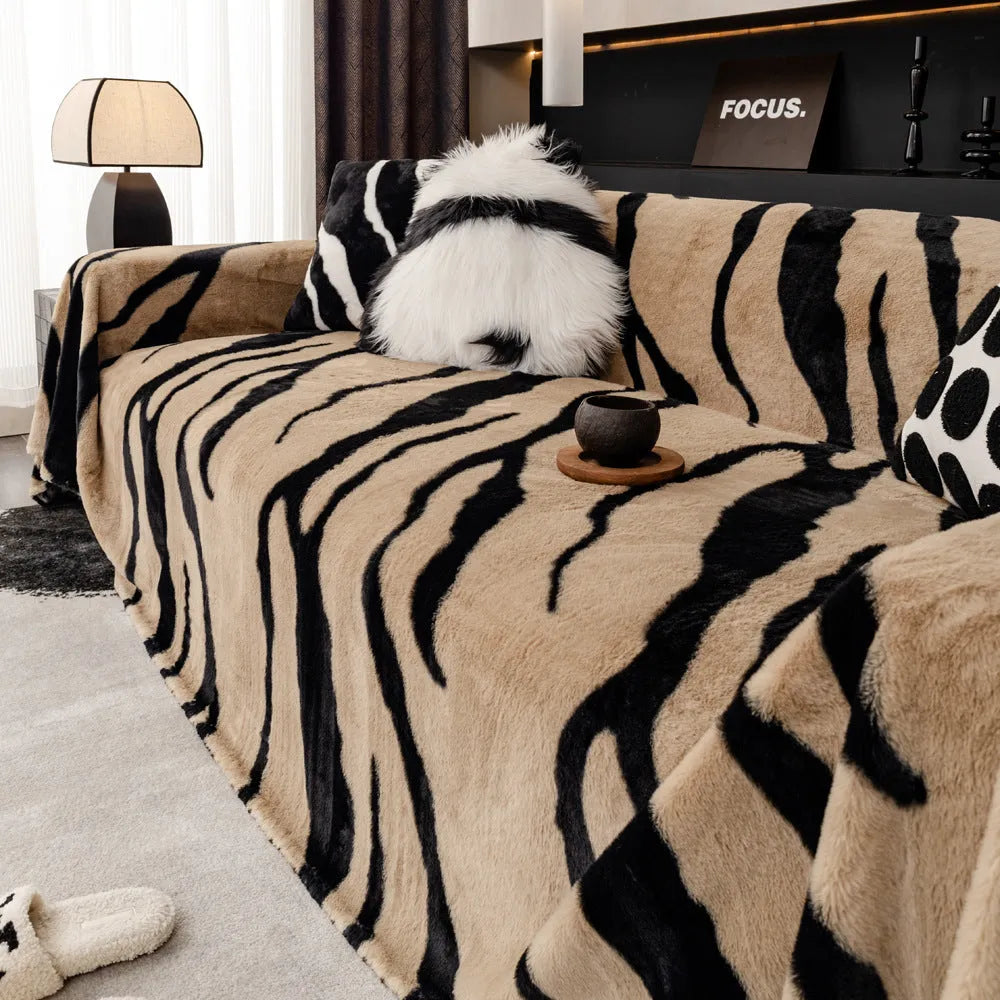 Zebra pattern flannel sofa slipcover in caramel colour showing non-slip underside and matching pillowcase