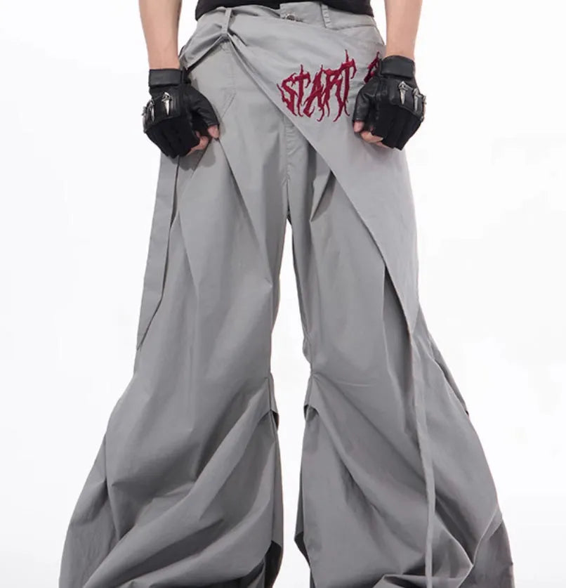Boy modelling black wide-leg Korean-style summer pants on a casual backdrop.