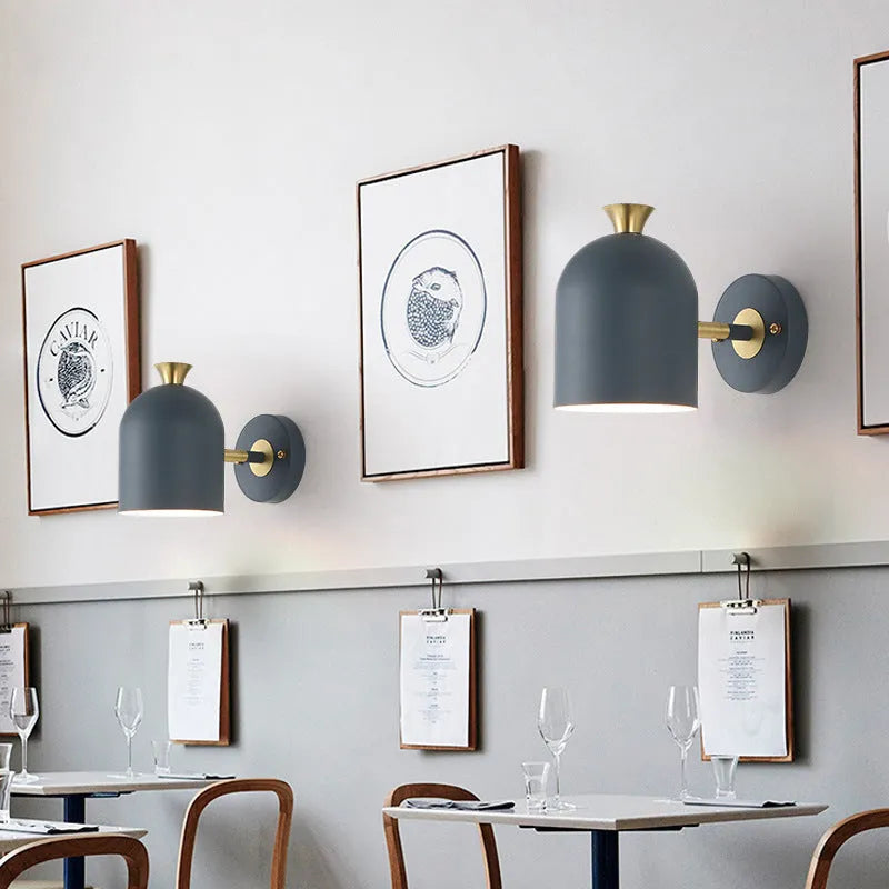 Single-head aluminium wall lamp with mirror front in choice of blue, green, pink or yellow LED light.