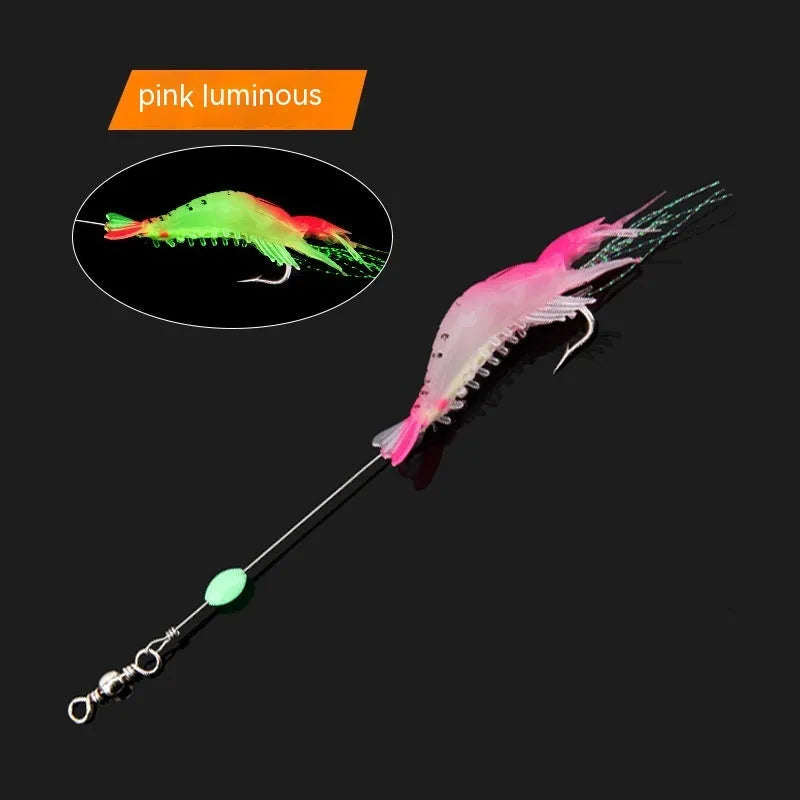 Luer soft fishing lure with metal hook in assorted colours including luminous pink and black head yellow body.
