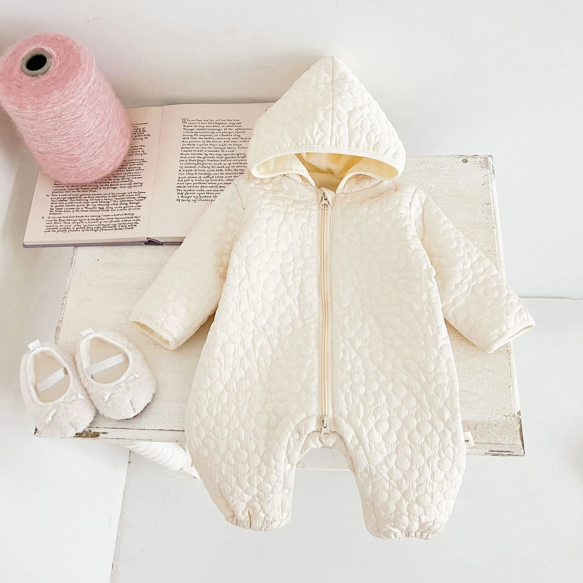 Baby cotton quilted romper with hood in beige, long sleeves, zip-up front