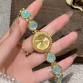 Women's quartz watch with 25mm round dial in six colour options including milky white and dark green