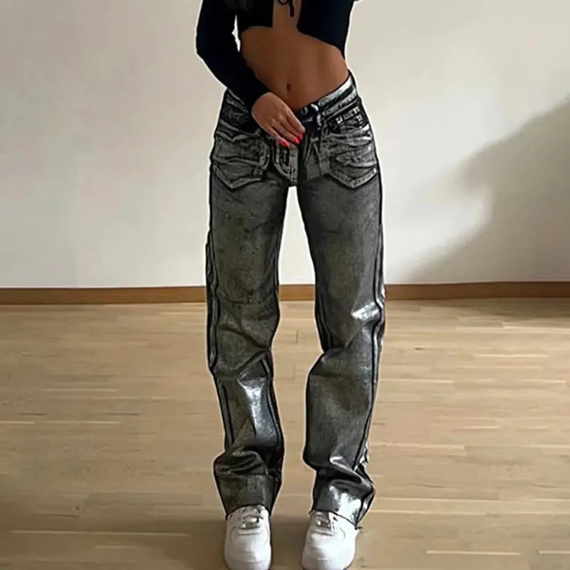 Washed blue high-waist straight-leg jeans on a hanger, showing the front view.