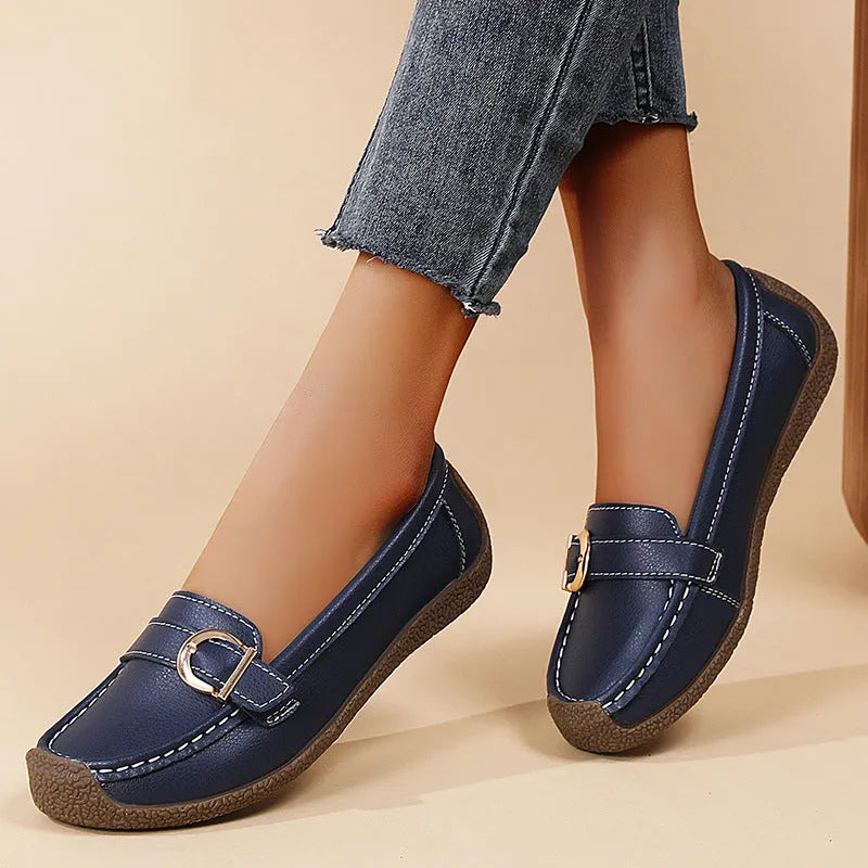 Women's beige casual loafers with a round toe and shallow slip-on design on a soft beef tendon sole.