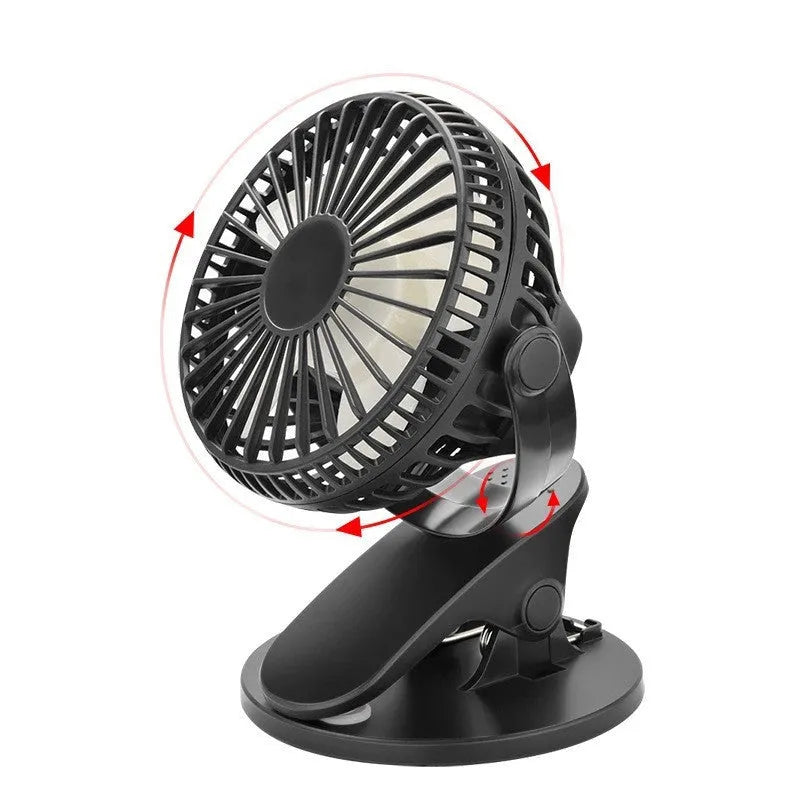 White USB rechargeable mini clip fan attached to a desk edge showing piano button switch and plastic blades.