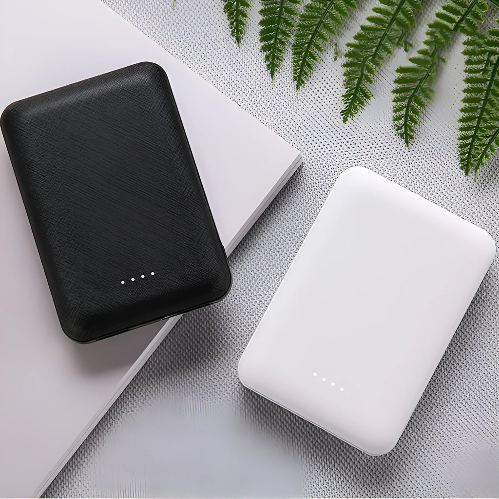 Ultra-thin 10,000mAh power bank in black or white with multi-USB ports