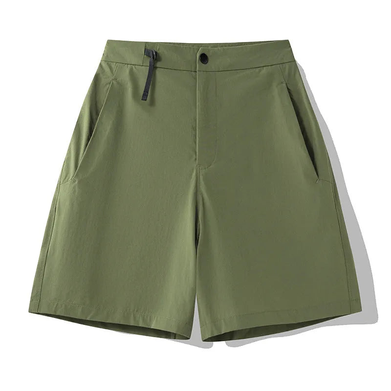 Men's solid colour quick-drying sports shorts with elastic construction, shown in khaki colour