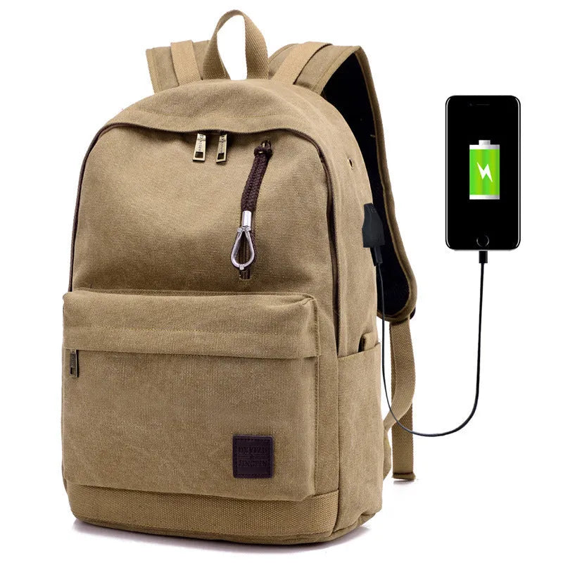 Canvas backpack with USB charging port showing multiple compartments including laptop pocket
