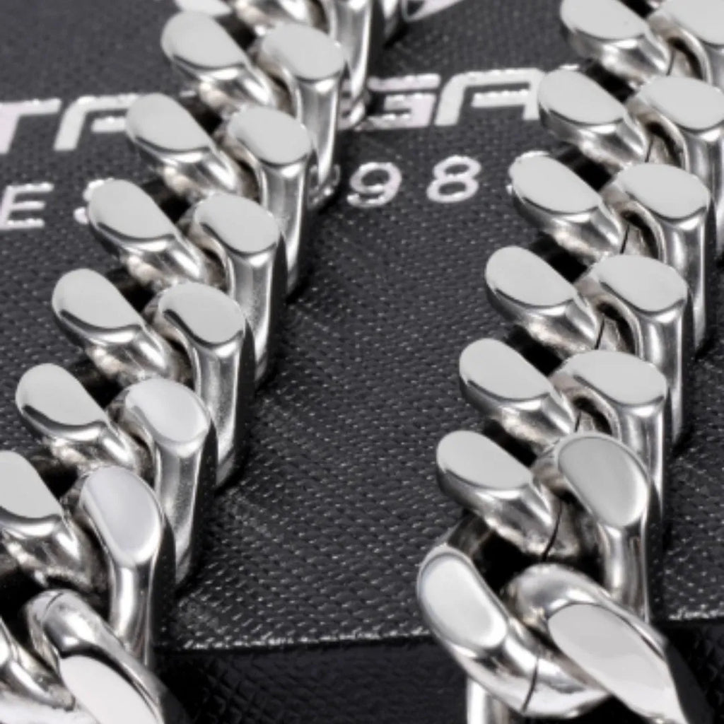 Polished titanium steel Cuban link choker chain necklace in 12mm width on black background
