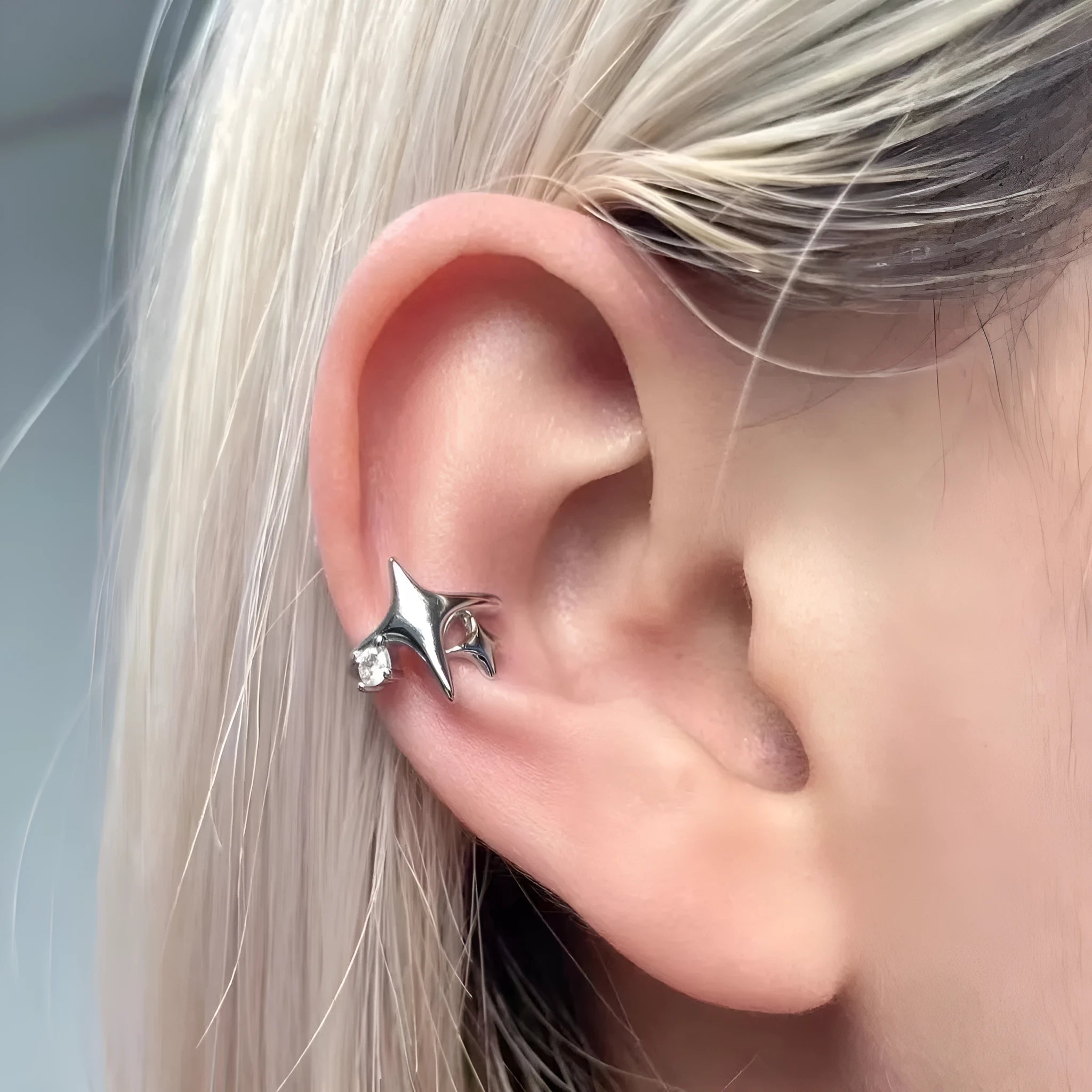 Women's retro geometric small diamond four eight-pointed stars ear clip in silver with electroplated finish