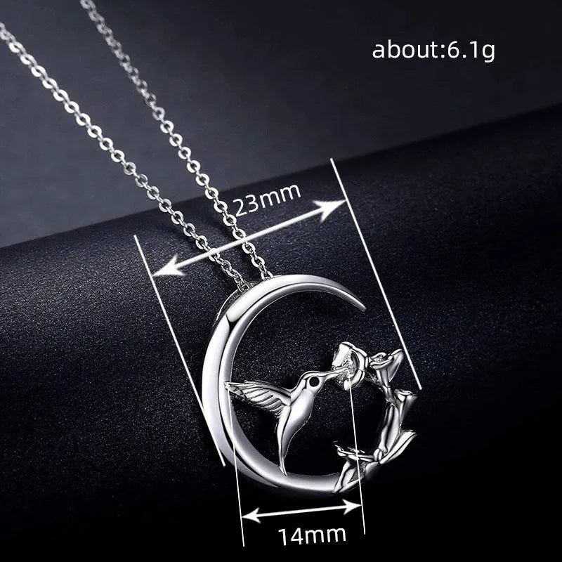 Copper O-link chain necklace for women with morning glory blossom and hummingbird pendant in platinum white gold colour