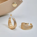 Simple geometric earrings and ear clips in silver and gold colour options