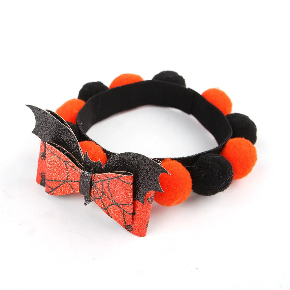 Halloween pet fur ball collar accessory for small dogs and cats in pumpkin, skull, and witch designs.