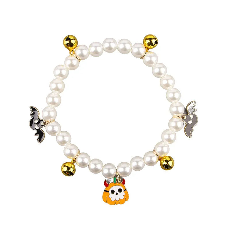 Halloween cat collar decoration with simulated pearls and pumpkin designs