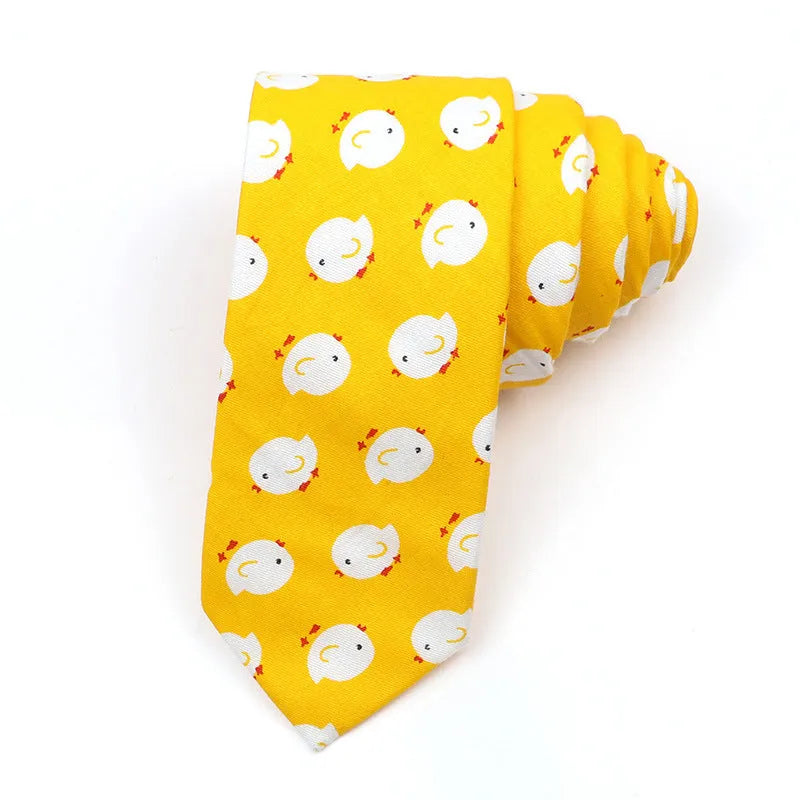 Narrow cotton bow tie with a printed cartoon pattern in a selection of colours.