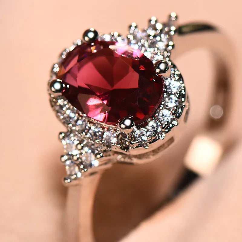 Adjustable open mouth copper ring with oval ruby stone in white gold colour