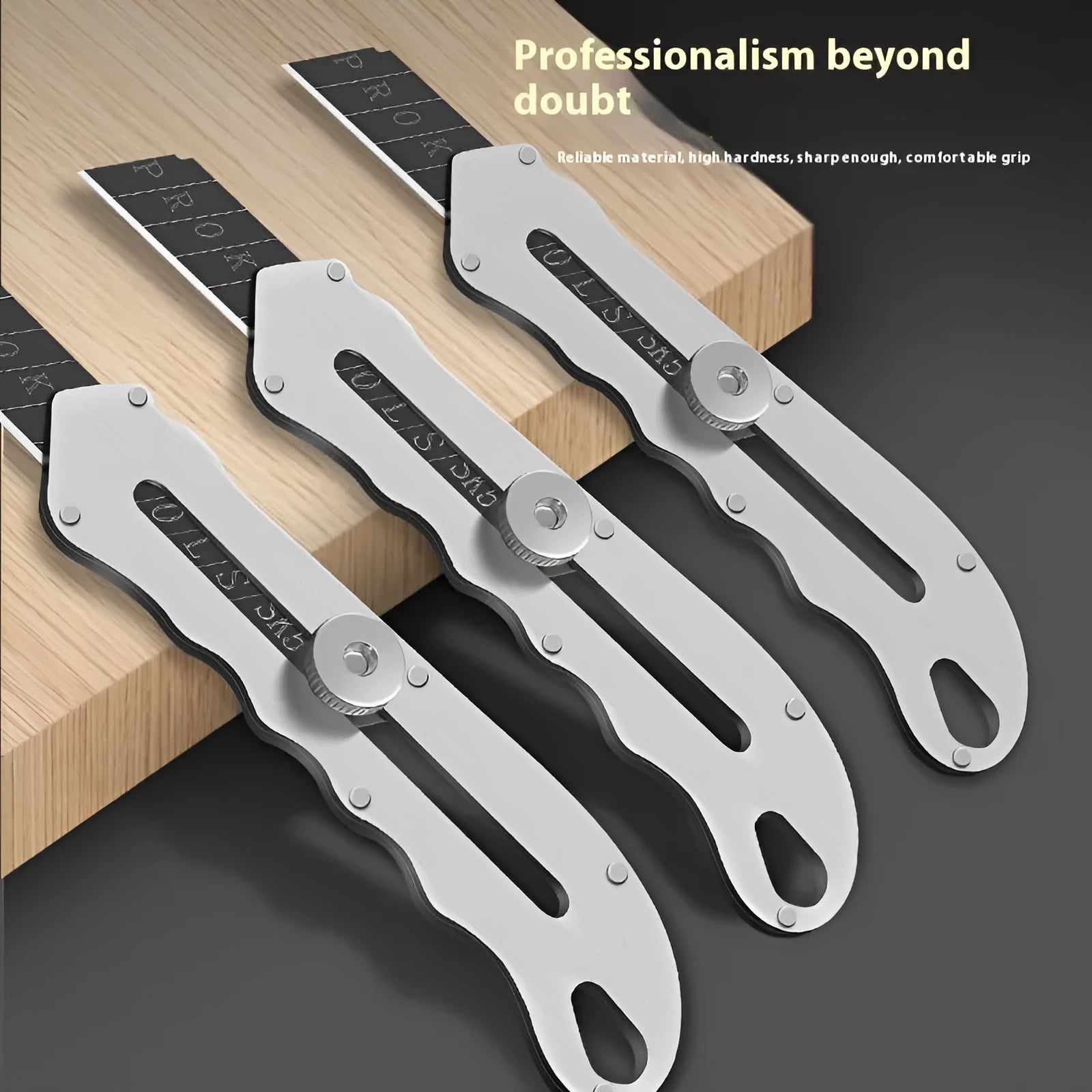 Stainless steel folding art knife with black blade and package of replacement blades