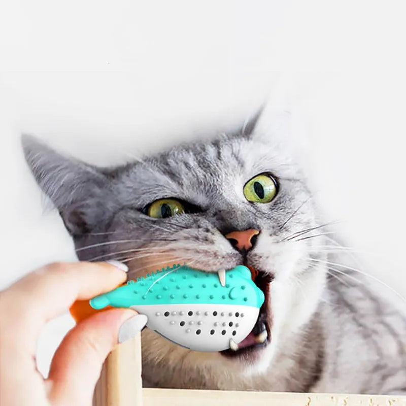 Silicone fish-shaped cat chew toy in blue, green, pink, or yellow colours for reducing destructive chewing