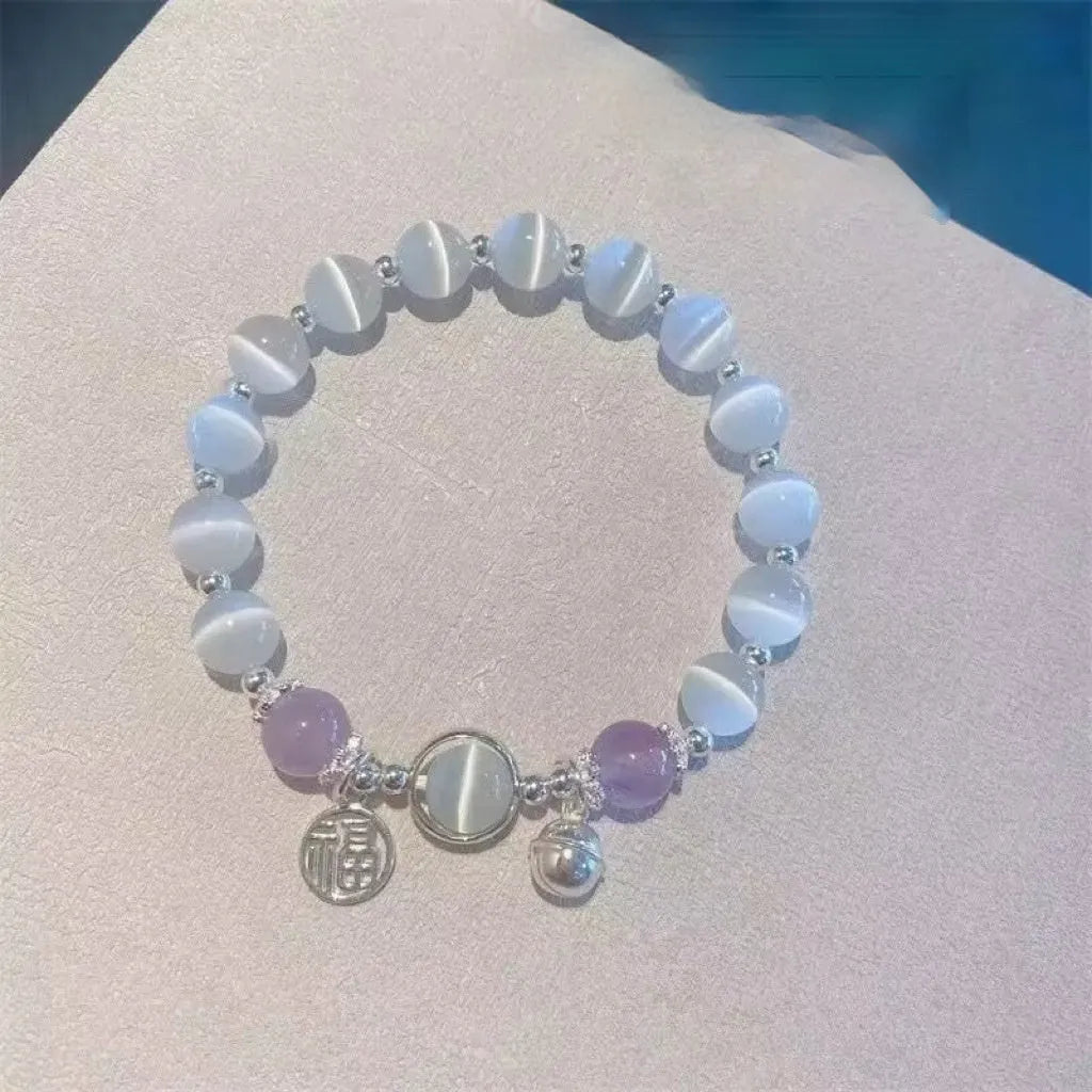 Women's glass butterfly bracelet with coloured glaze beads in drop shape design