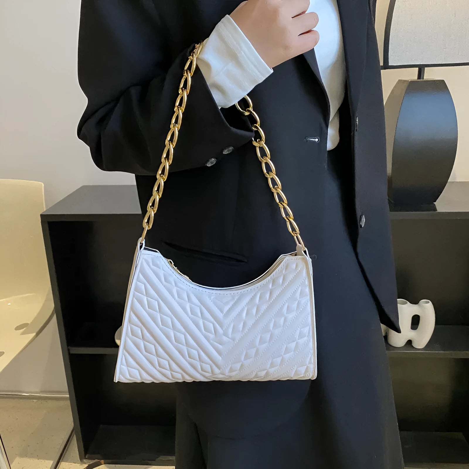 PU leather pleated chain baguette bag in vertical square shape with shoulder strap and carry handle