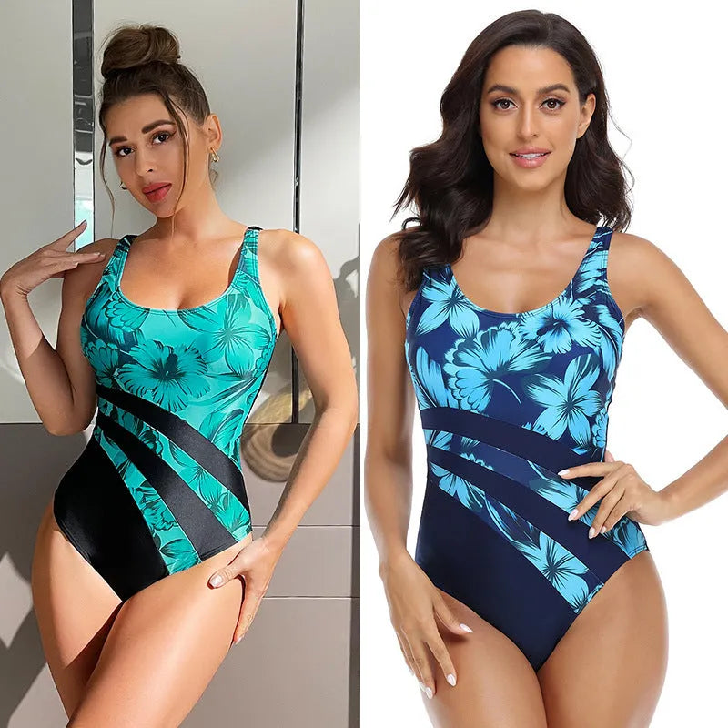 Women's green and blue printed one-piece swimsuit with conservative briefs style.