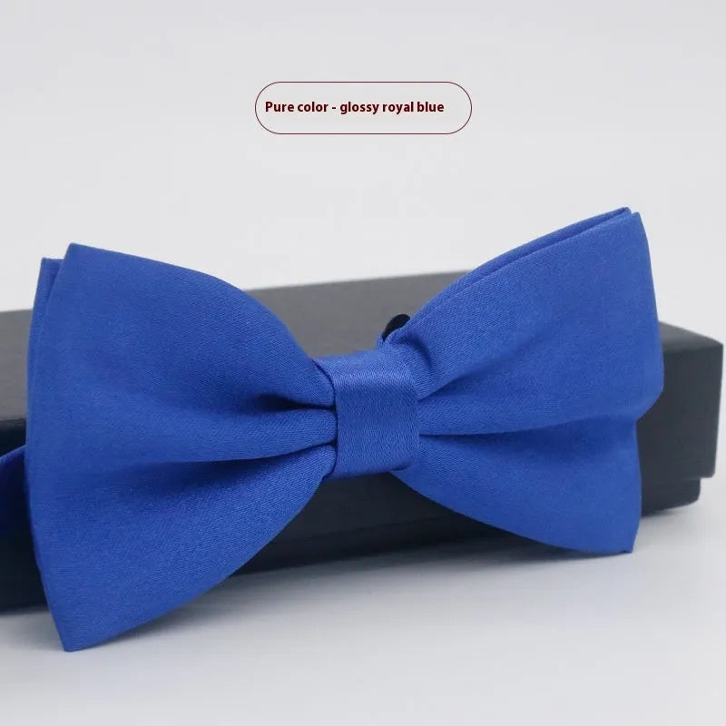 Solid colour polyester bow tie with flat head design measuring 12cm by 6cm