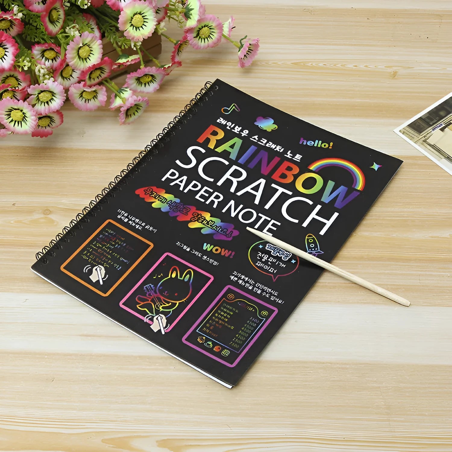 Children's large format scratch art paper with colourful puzzle design and scraper tool