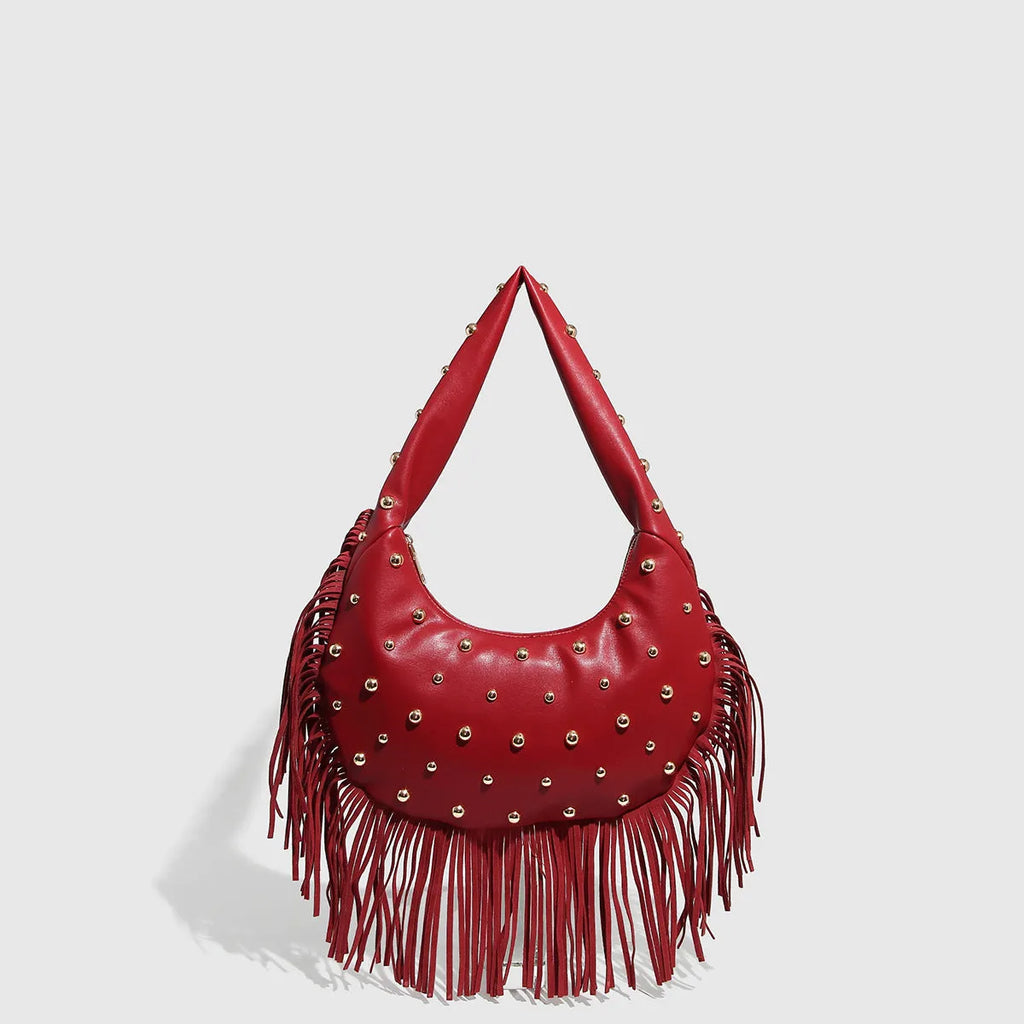 Retro black shoulder handbag with a tassel detail and an internal mobile phone pocket.