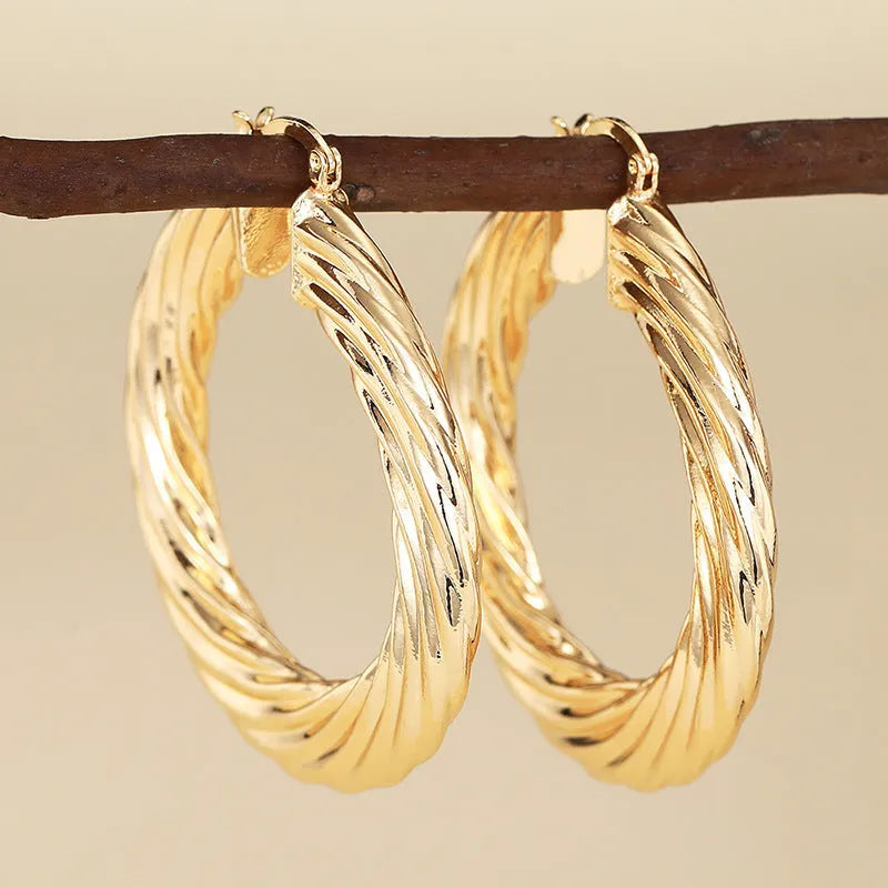 Women's copper geometric drop shape clip earrings with electroplating finish, European American style