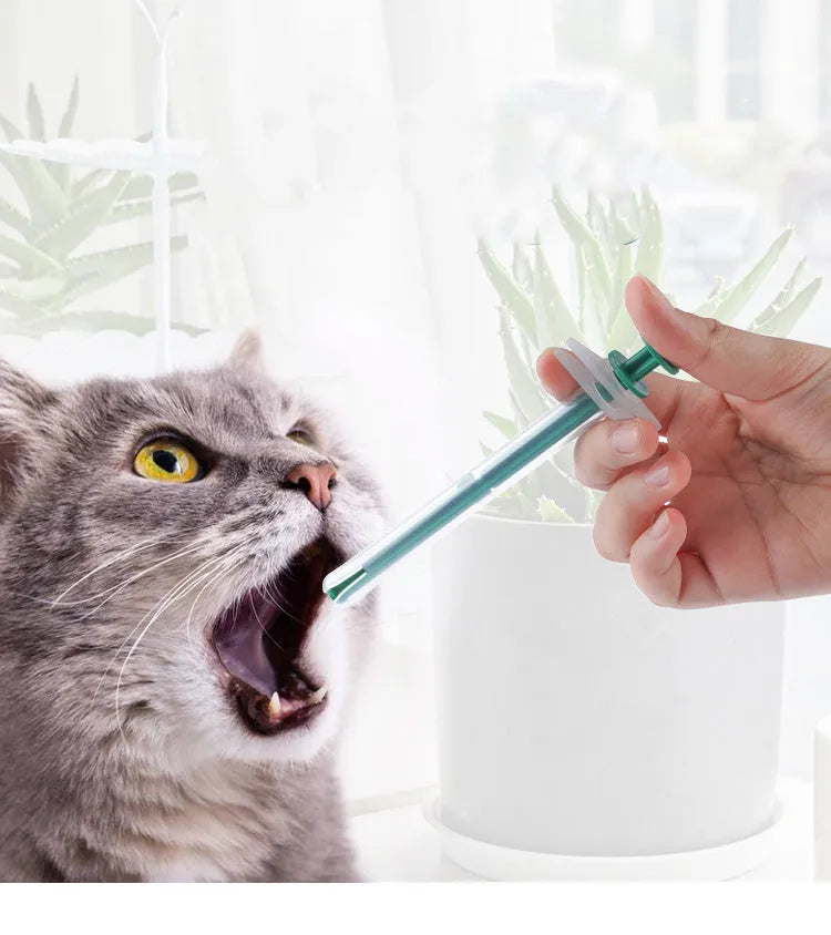 Two pet pill shooters with soft silicone tips for administering medication to cats and small dogs