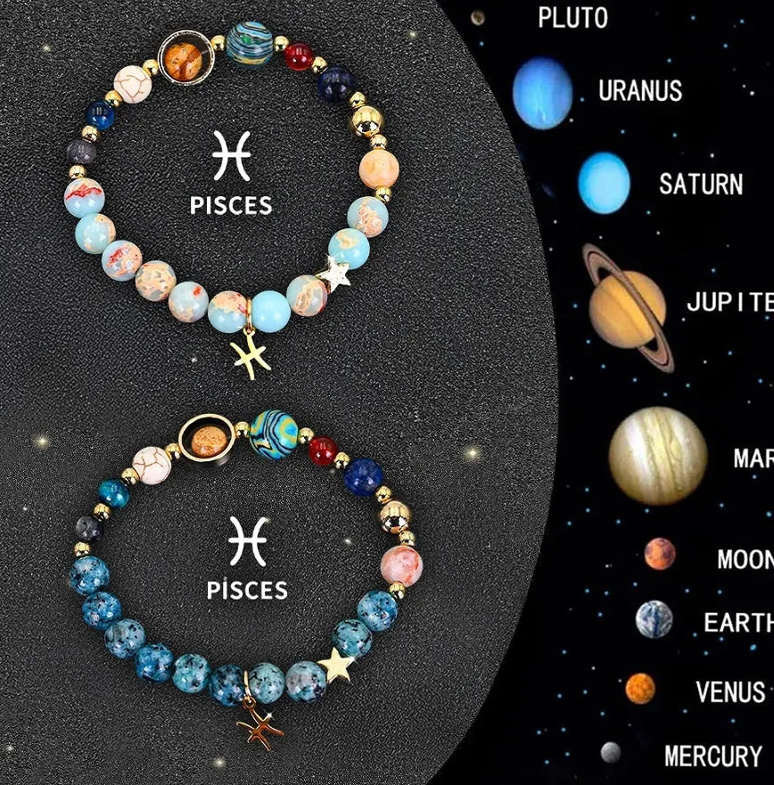 Two natural stone beaded bracelets on a table representing zodiac sign jewellery.