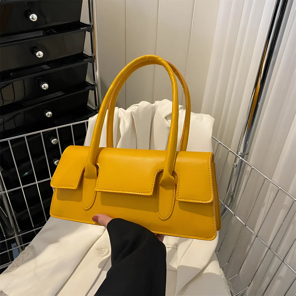 Women's horizontal square shoulder bag in PU leather with decorative stitching and single strap