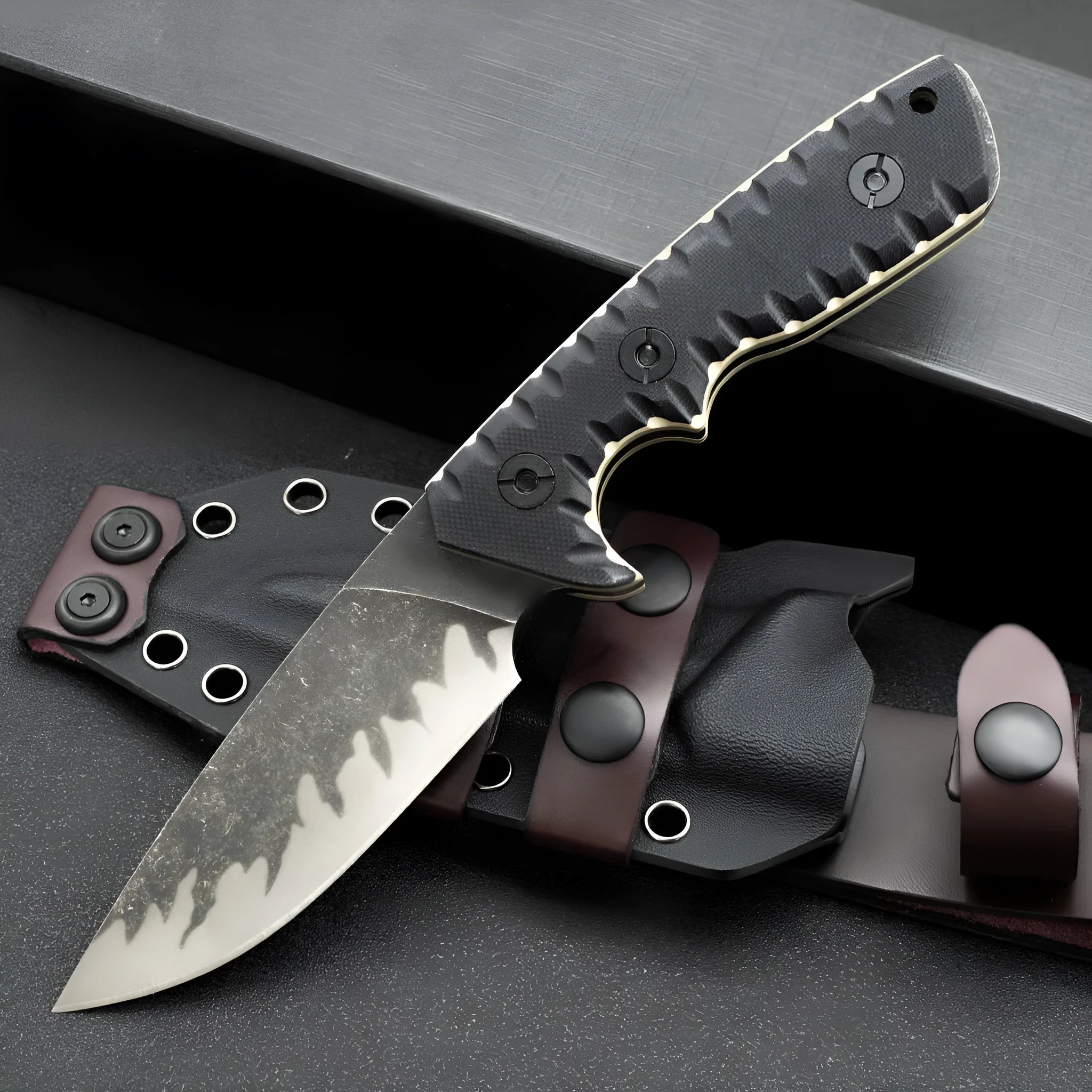 Portable camping knife with black handle and 100mm blade on plain background