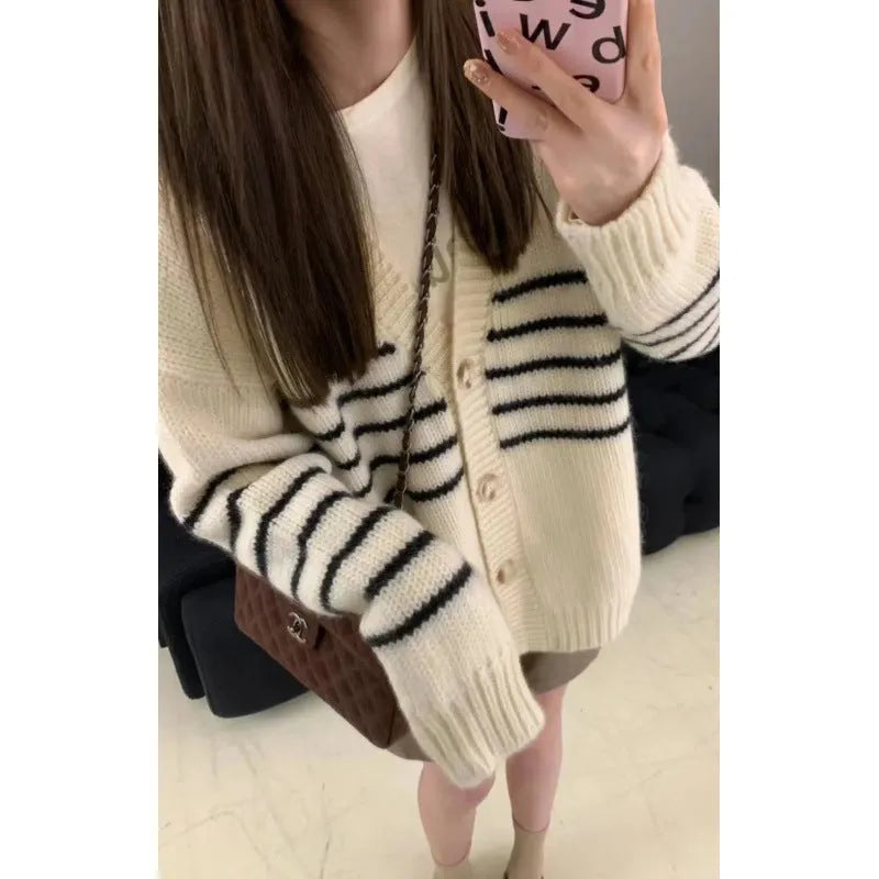 Collar button cardigan sweater with 3D pattern design in pictured colour