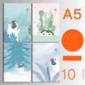 Bundle of ten soft-cover kraft paper notebooks with thread binding in various animal and nature designs.