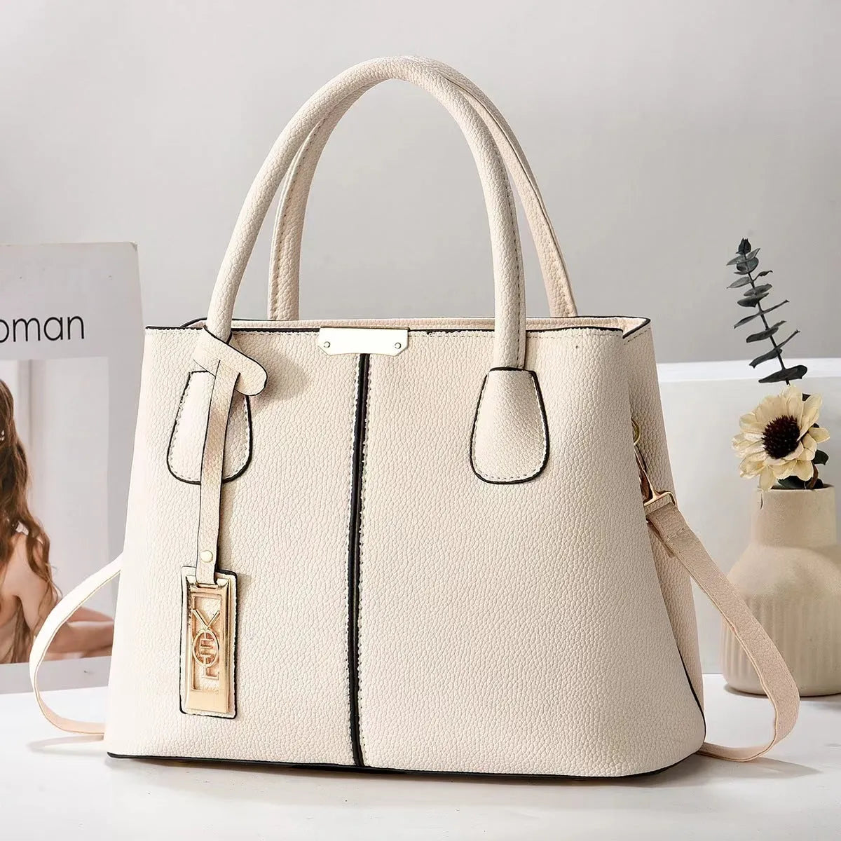 Soft PU fashion handbag with leather shoulder strap in horizontal square shape