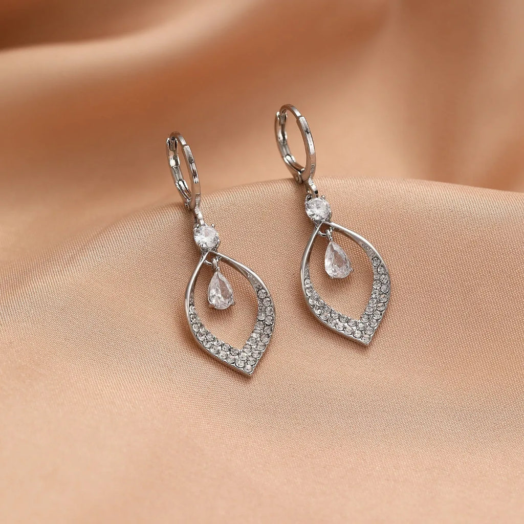 Copper water drop tassel earrings with a zircon stone and gold or silver ear buckles.