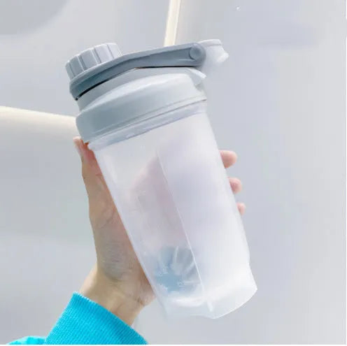 Blender shaker bottle with stirring ball, leakproof knob closure, available in purple, blue, pink, yellow, grey, 500ml and 700ml sizes