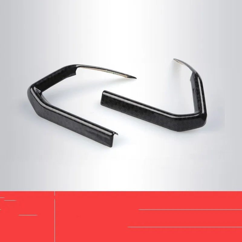 Pair of carbon fibre finish ABS steering wheel frames with adhesive backing for non-destructive car dashboard installation