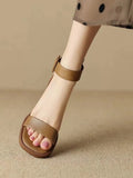 Women's white retro platform high heels with an ankle strap, shown from the side.