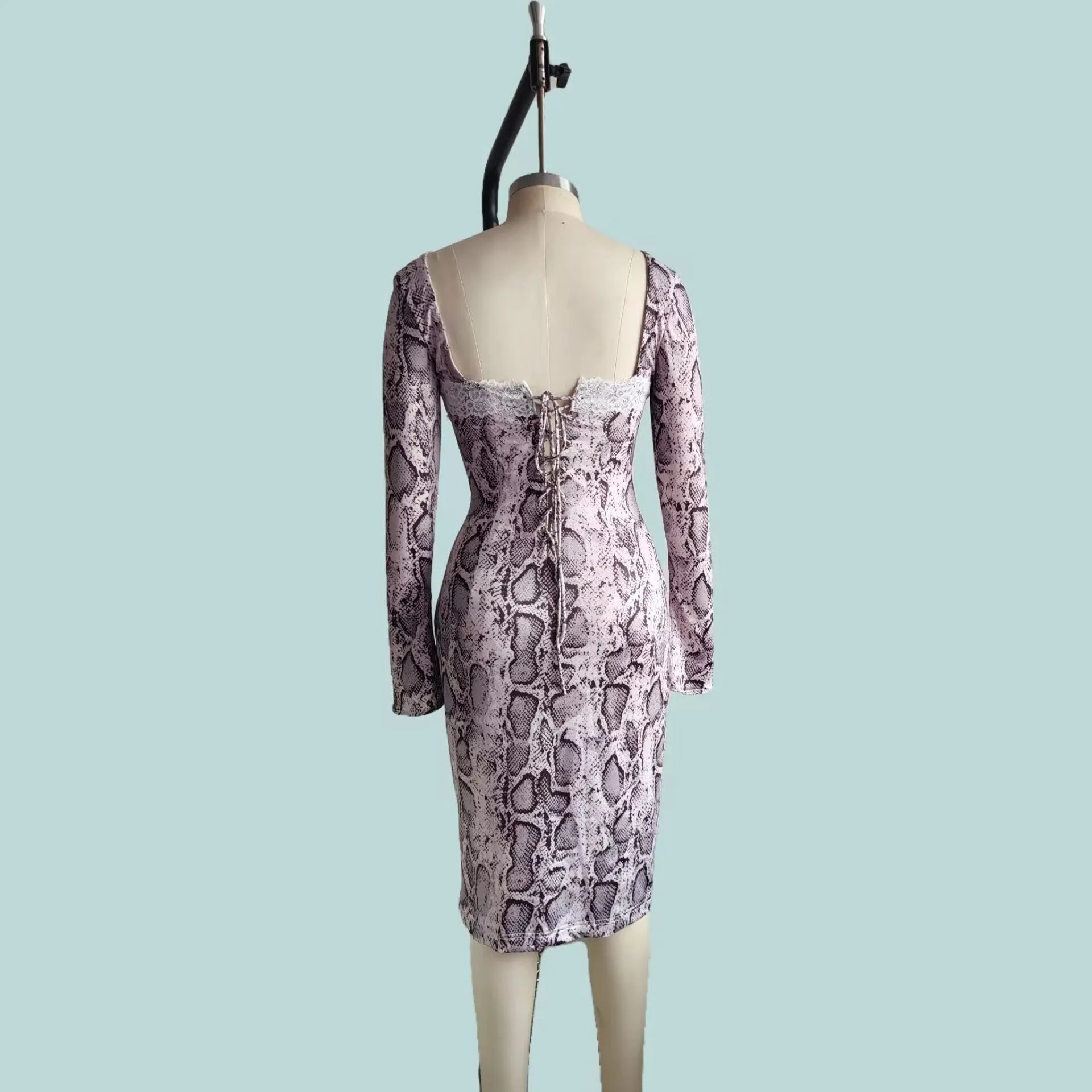 Grey slim fit lace dress with long sleeves, A-line skirt, and a 3D digital printed pattern.