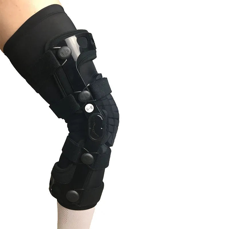 Black anterior ligament knee pad with iron-plastic skeleton construction shown in multiple sizes