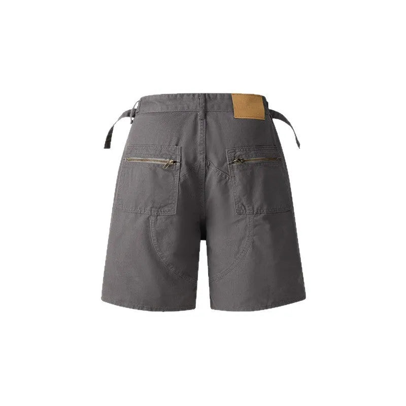 Retro workwear shorts in washed cotton with zipper closure and loose fit
