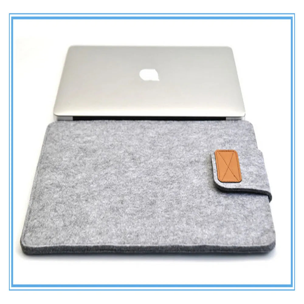 Khaki clamshell laptop bag open to show plush interior and corner protectors for tablet and notebook