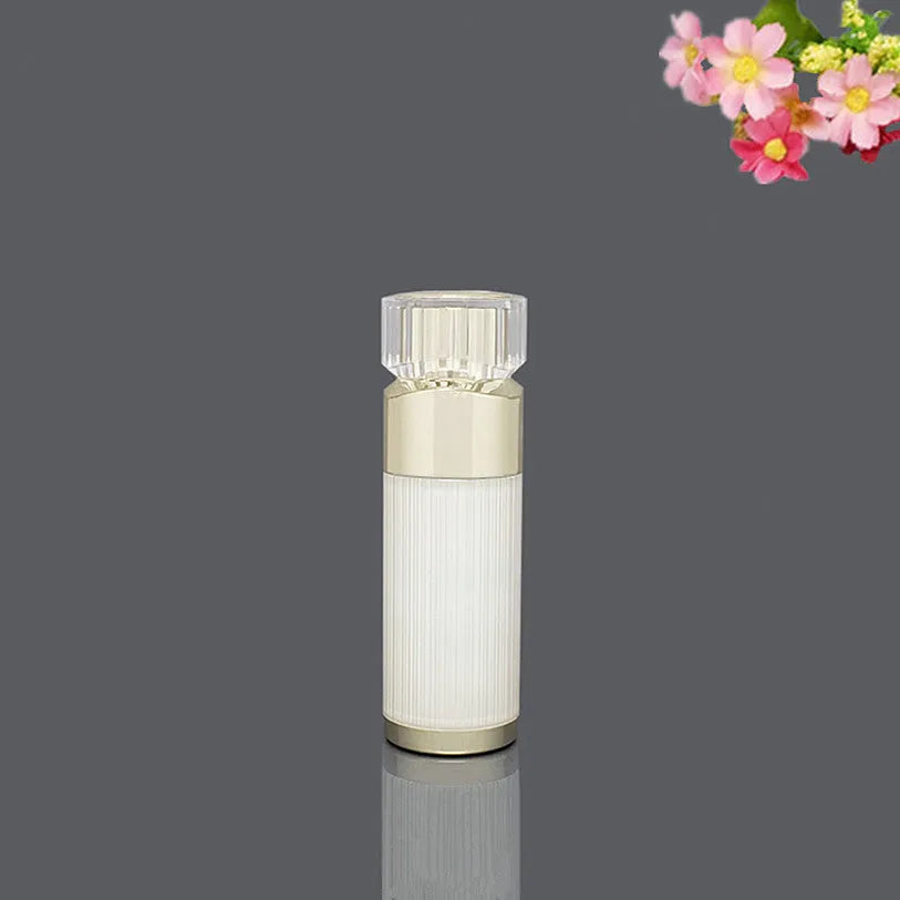 Acrylic cosmetics sub-bottling box with champagne gold and brushed white empty bottles in various sizes