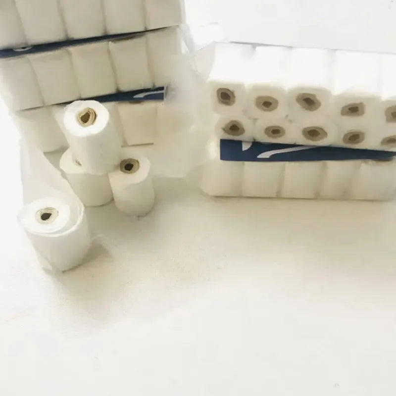 Small white simulated toilet paper roll model for children's educational toy play.