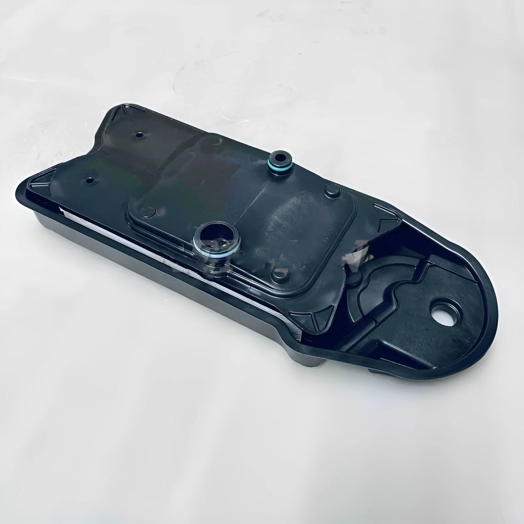 Black plastic automotive crankcase ventilation filter with circular connections