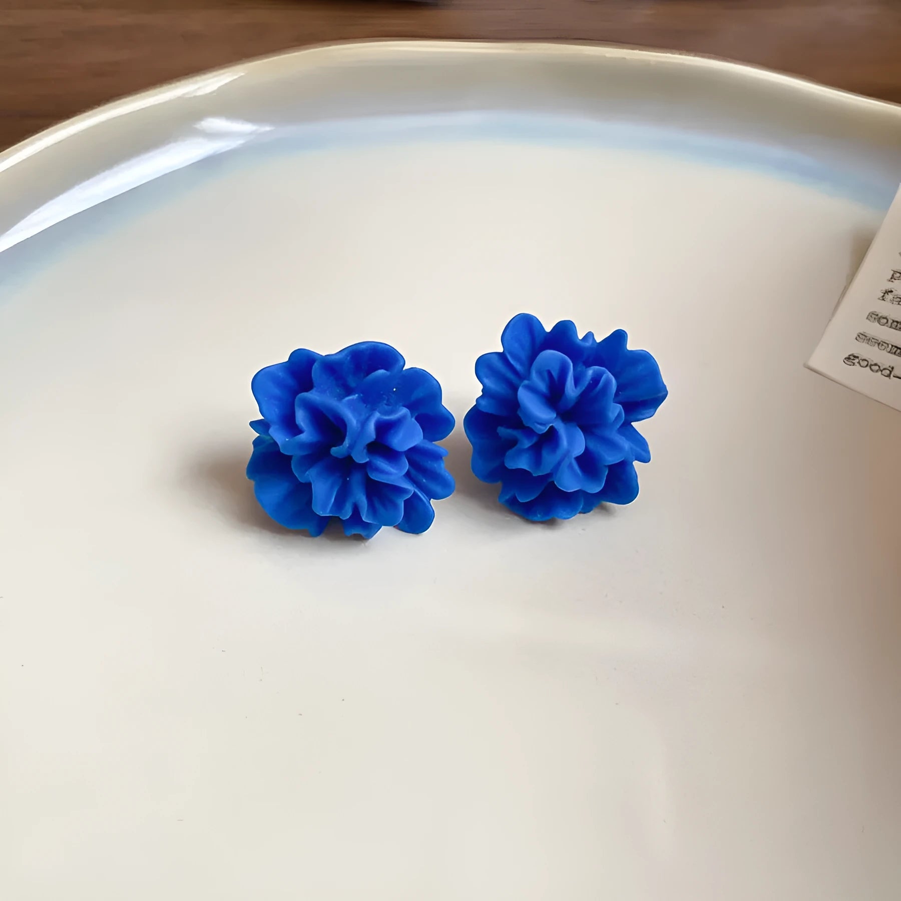 Handmade geometric cloth earrings with silver needle blue resin flower decoration