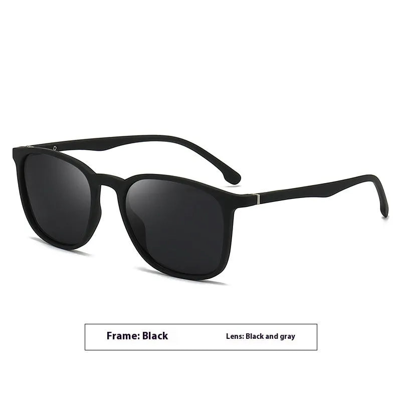 Men's polarised sunglasses with a black frame and dark green lens, showing PC construction and elastic paint finish.