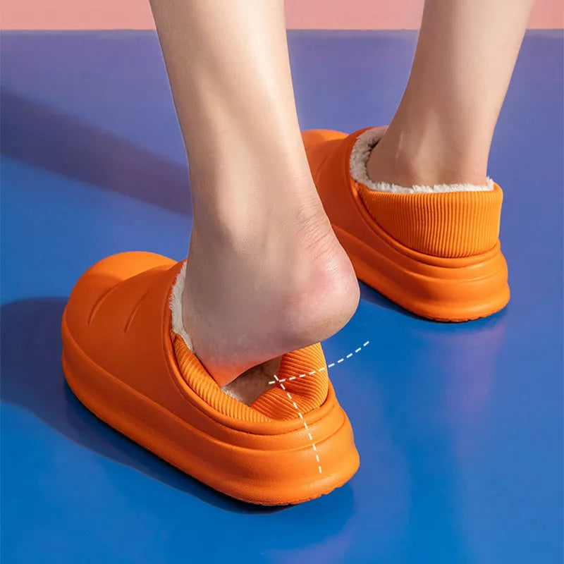 Women's waterproof EVA garden slippers in green, showing overshoe design with plush lining and non-slip sole.